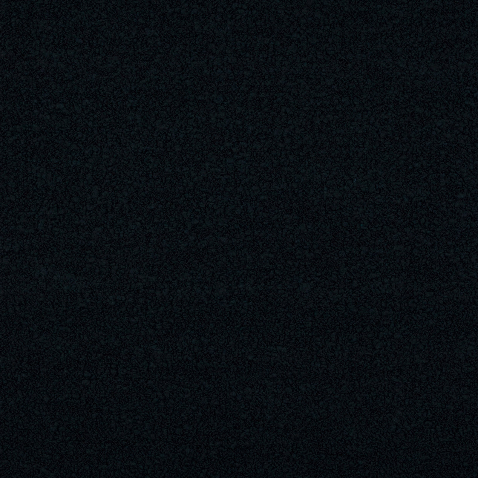 Close-up of deep navy woven fabric with a fine matte texture