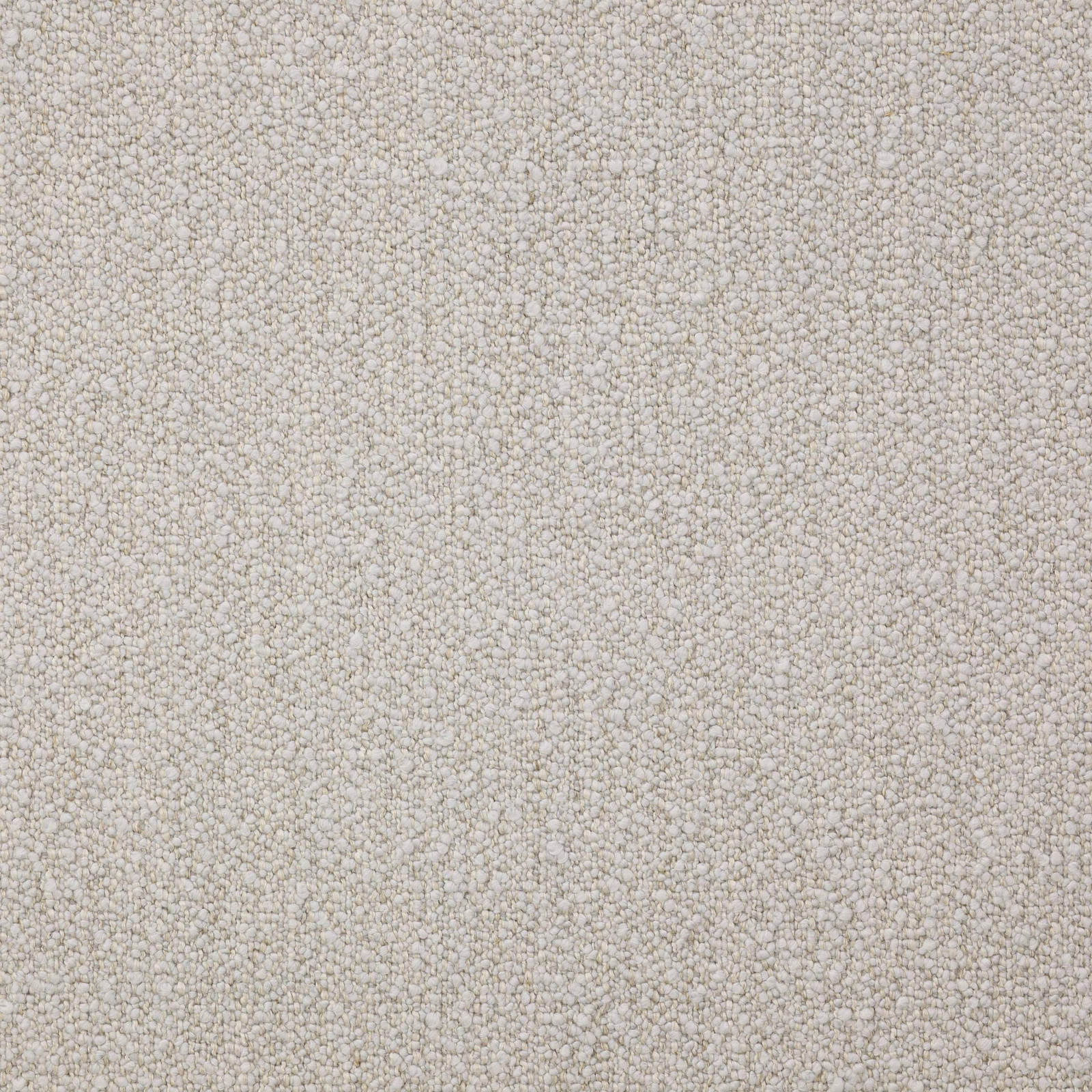 Close-up of a soft warm greige boucle-textured fabric with a fine pebble weave