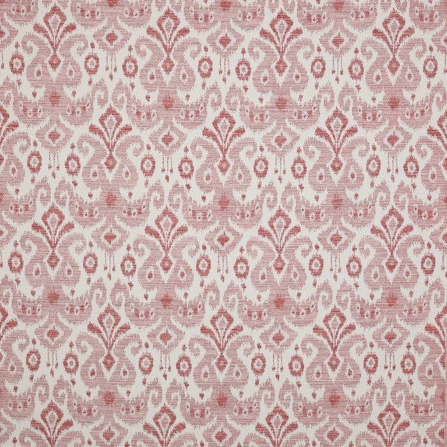 Pink-and-ivory damask fabric with a textured woven ground