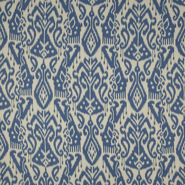 Blue and ivory damask fabric swatch with ornate repeating motif
