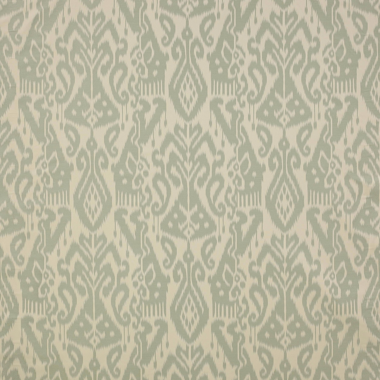 Soft sage green and ivory damask fabric with ornate scrolling motifs