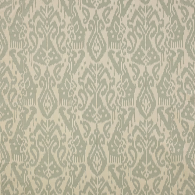 Soft sage green and ivory damask fabric with ornate scrolling motifs