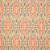 Coral, green and cream geometric linen fabric swatch with diamond motifs