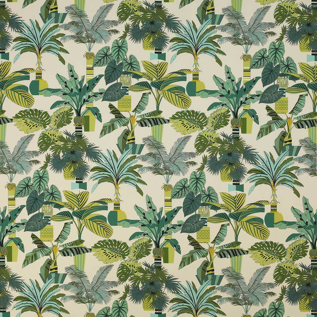Tropical palm and leaf print in lagoon, jade and lime greens on a cream cotton ground