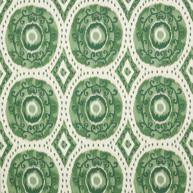 Emerald green circular medallion fabric with cream ground and woven texture