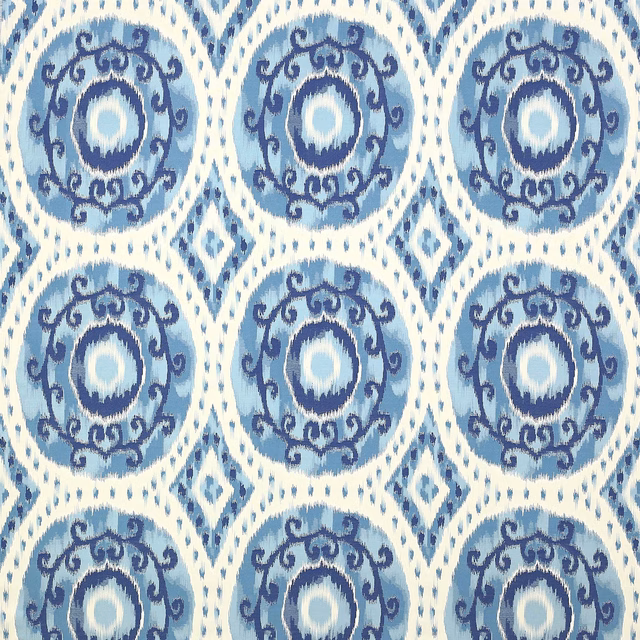 Blue and ivory woven damask fabric with circular medallion motifs