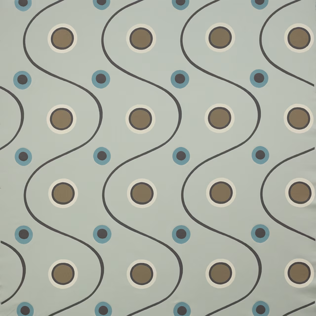 Celadon fabric swatch with wavy black lines and blue ring motifs