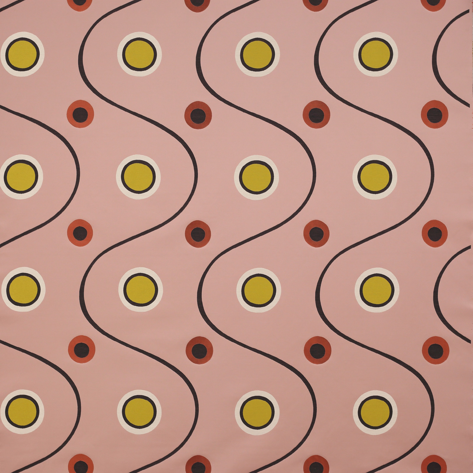 Pink printed fabric with wavy black lines and yellow and coral circle motifs