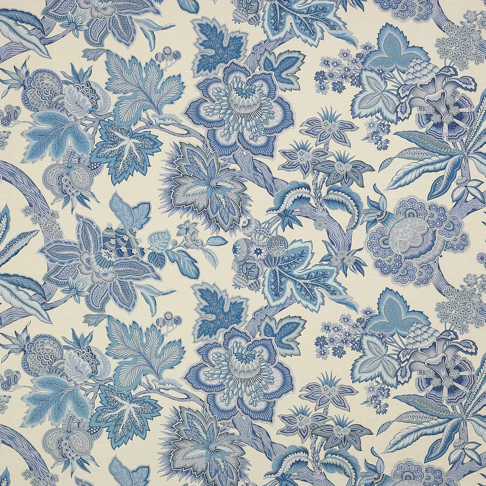 Blue floral linen fabric with detailed layered blossoms on an ivory ground
