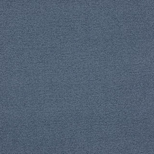 Close-up of soft slate-blue woven fabric with a fine pebbled texture