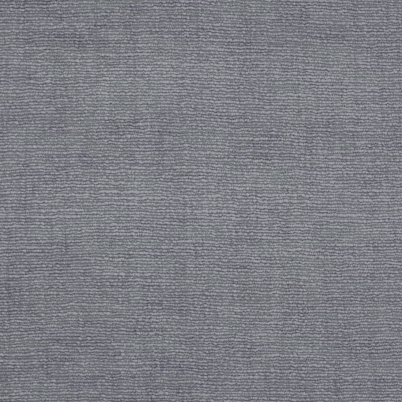 Close-up of a softly rippled pale blue-grey woven fabric with fine texture