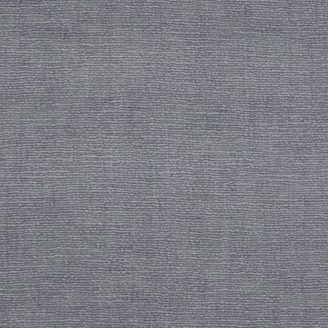 Close-up of a softly rippled pale blue-grey woven fabric with fine texture