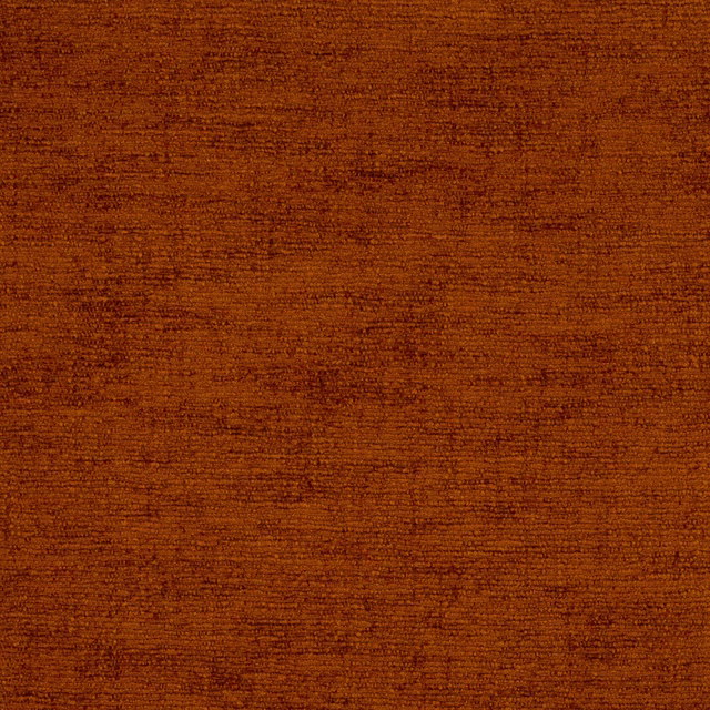Close-up of burnt spice orange woven fabric with fine mottled texture