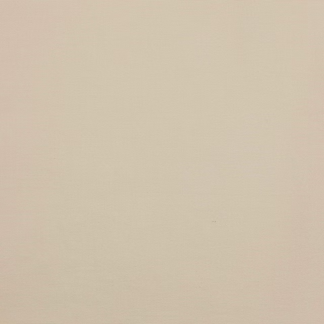 Close-up of plain soft beige cotton fabric with a fine woven texture
