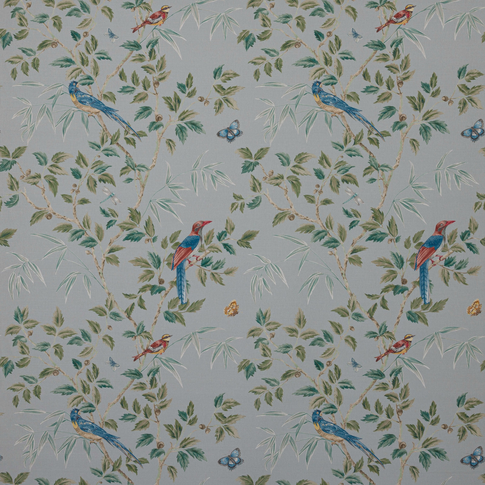 Ashdown Old Blue fabric swatch with birds, leaves and butterflies on a misty blue ground