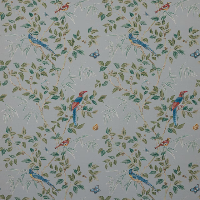 Ashdown Old Blue fabric swatch with birds, leaves and butterflies on a misty blue ground