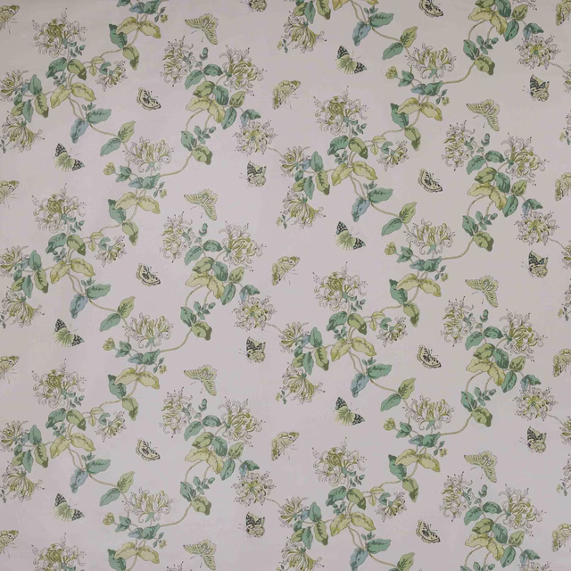 Pale floral chintz print with soft green vines and butterflies on cream