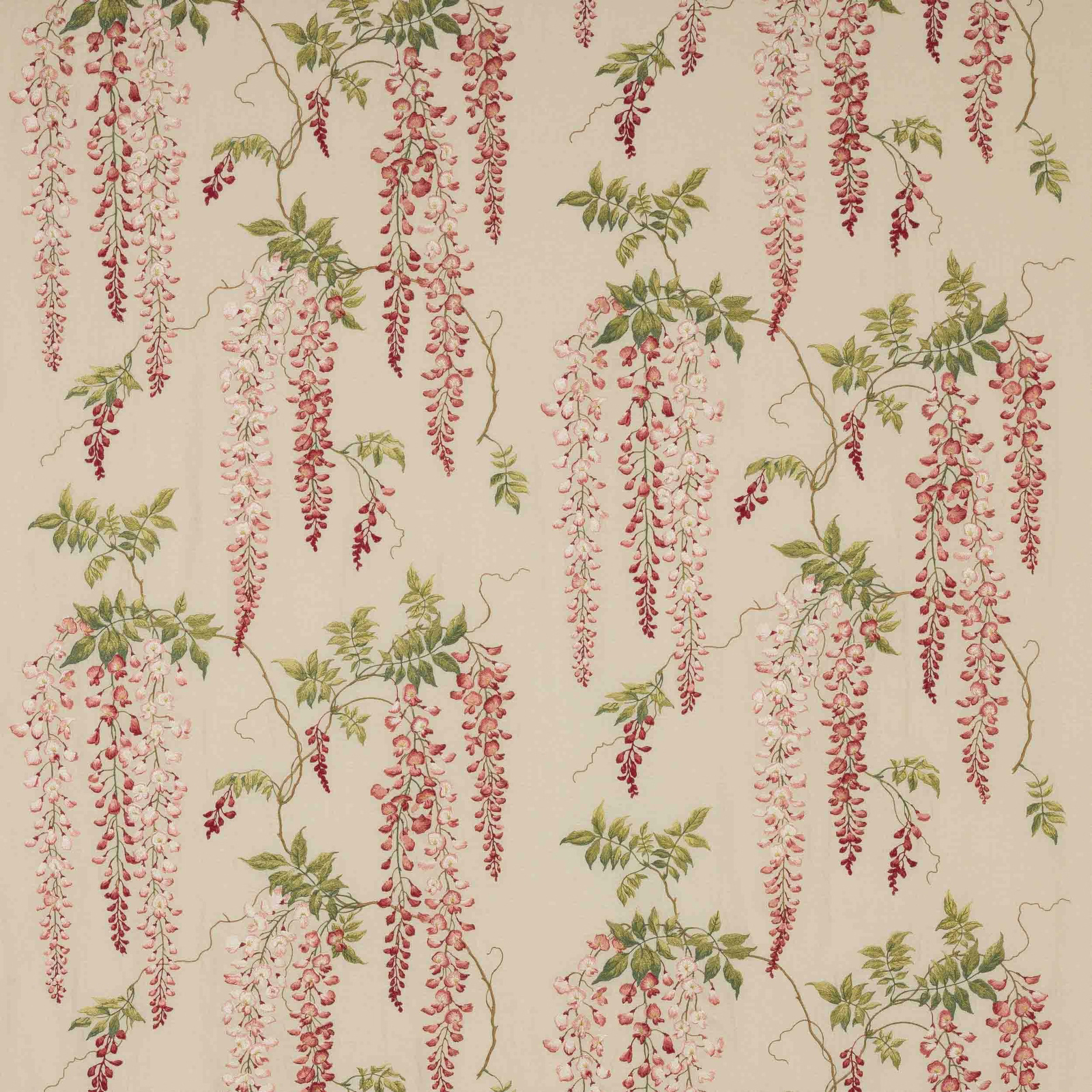 Pink and green trailing floral fabric swatch on a pale ground