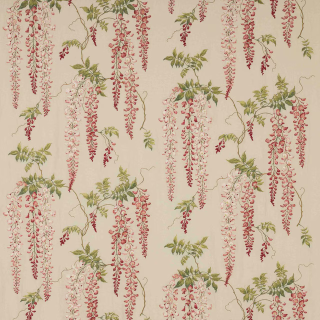 Pink and green trailing floral fabric swatch on a pale ground