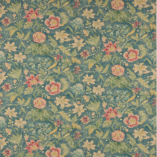Painterly floral linen in muted teal blue with cream, pink and green blossoms
