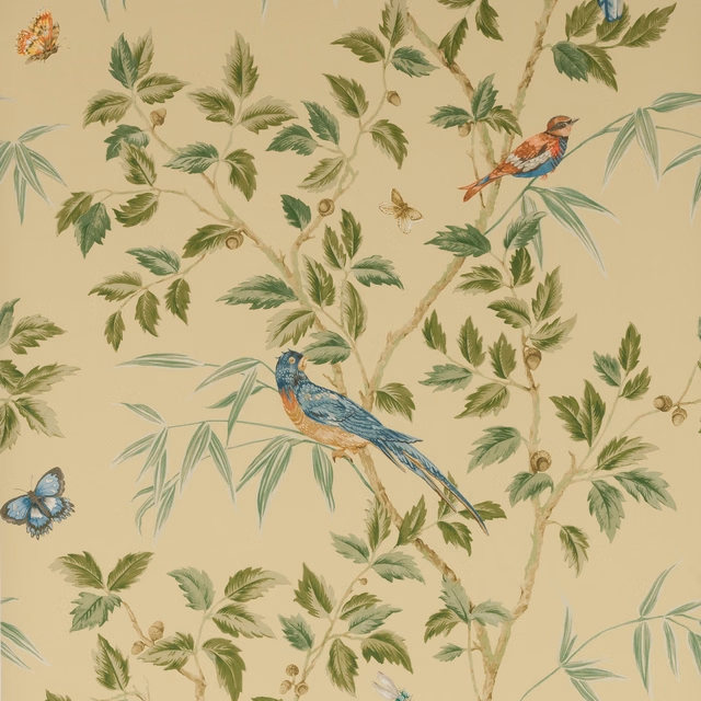 Muted yellow wallpaper with green branches, blue birds and delicate butterflies