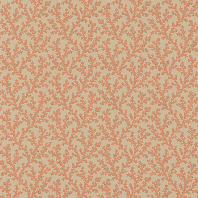 Dusty coral branching botanical sprigs on a pale peach wallpaper ground
