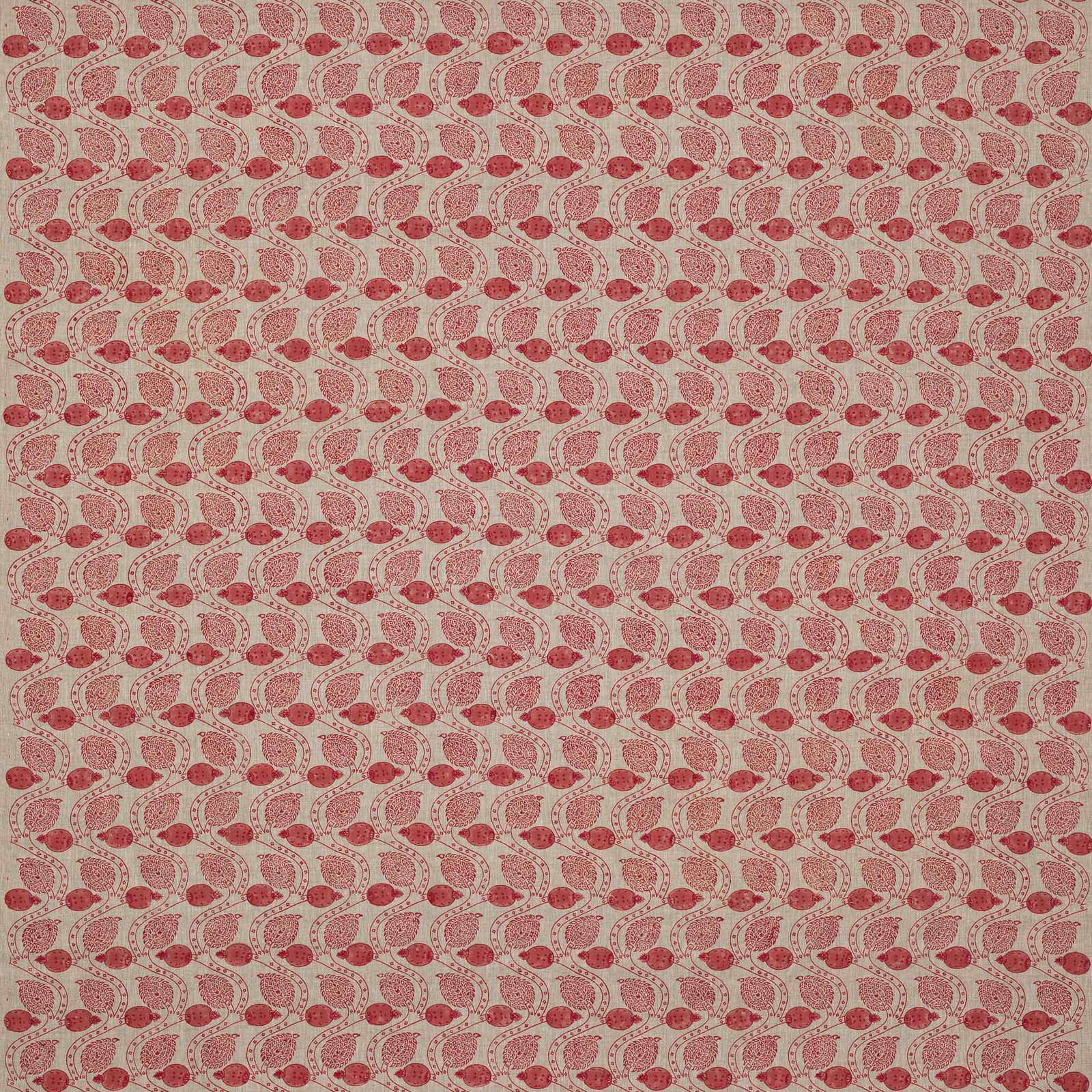 Small red paisley block print on pale linen ground