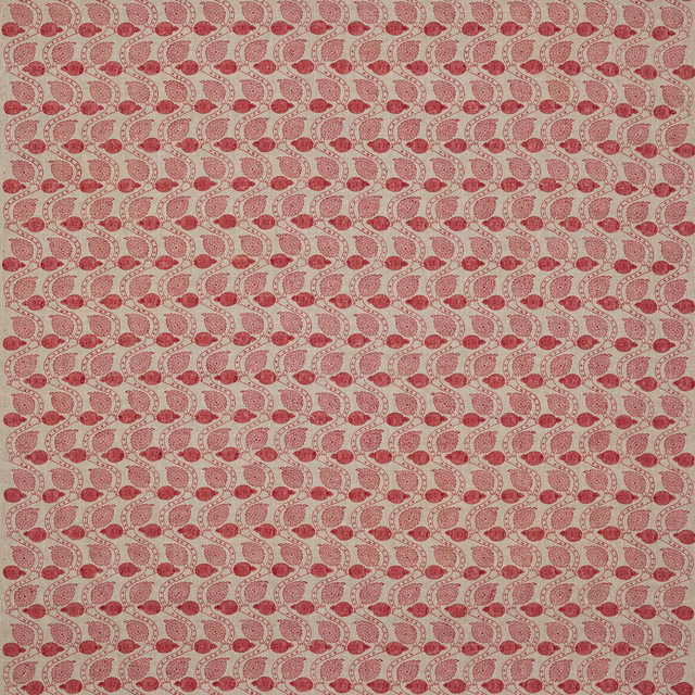 Small red paisley block print on pale linen ground
