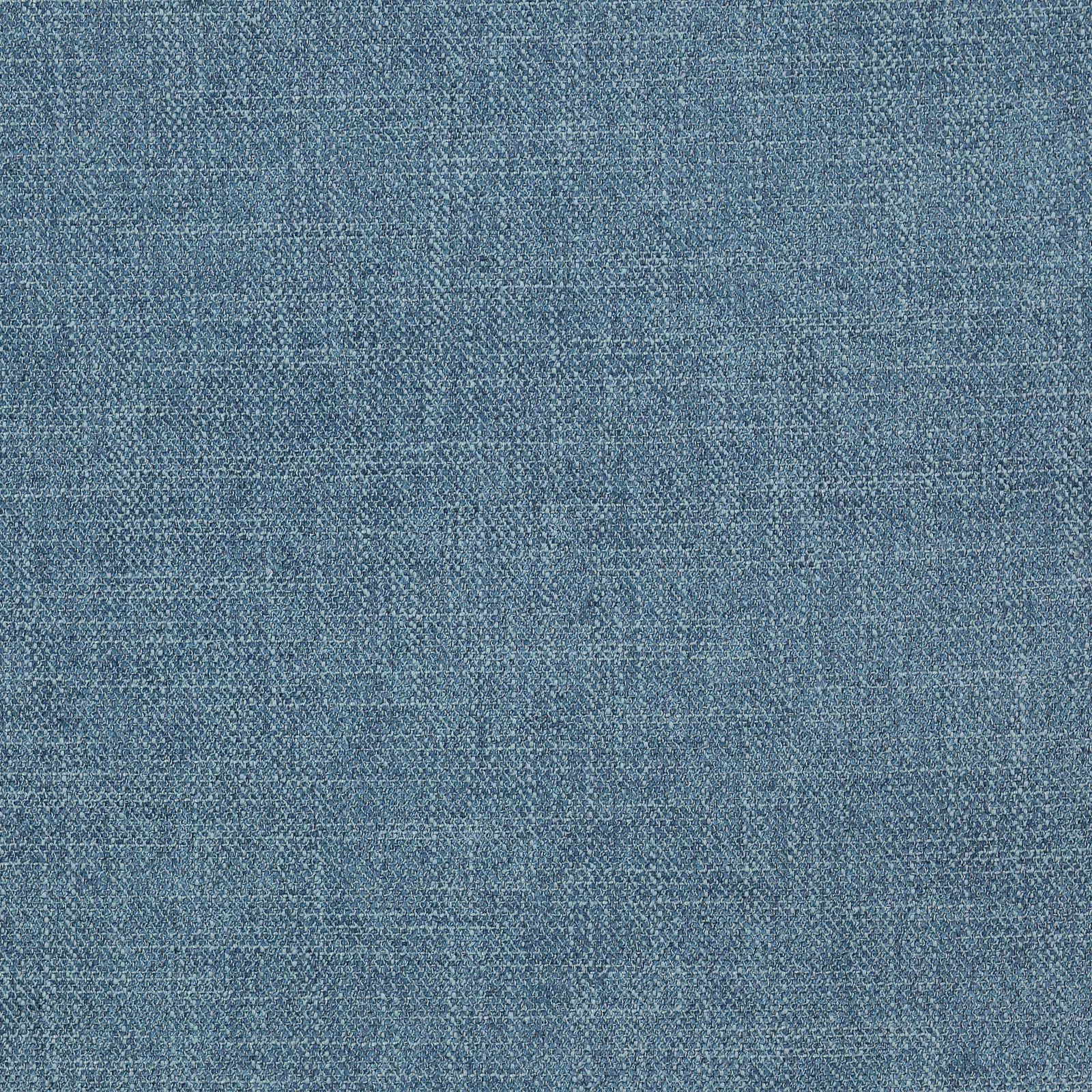 Close-up of softly textured muted blue woven fabric with fine flecked surface