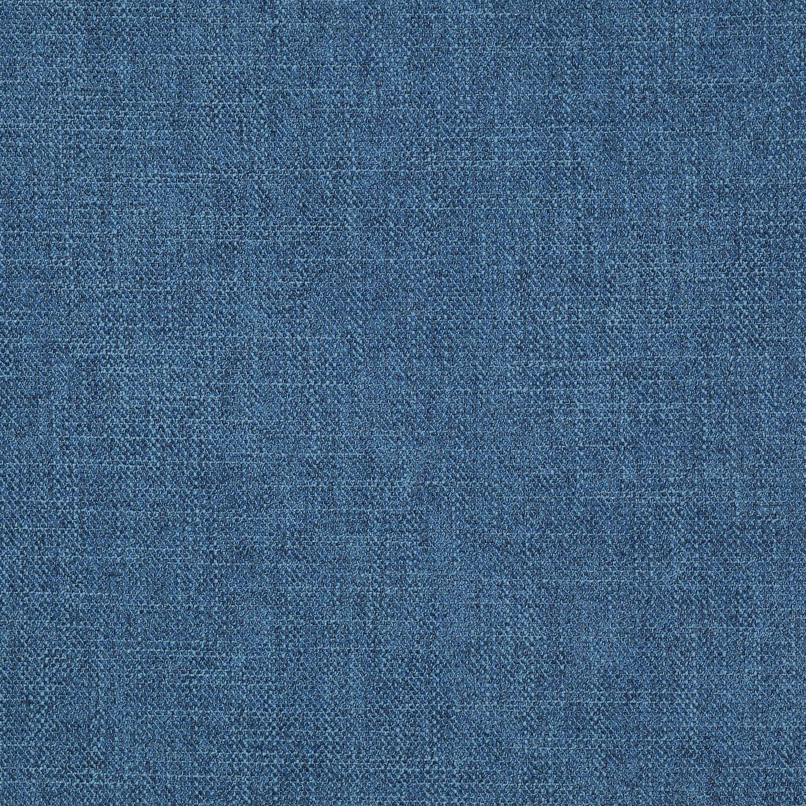 Close-up of muted cobalt blue woven fabric with fine crosshatch texture