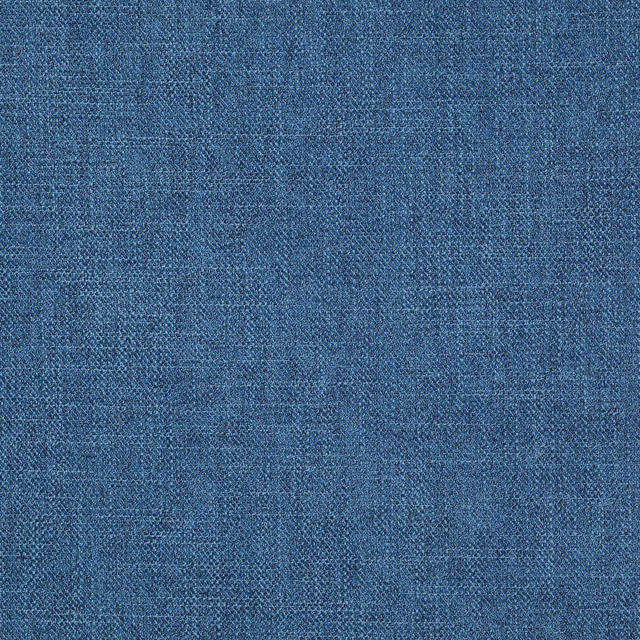 Close-up of muted cobalt blue woven fabric with fine crosshatch texture
