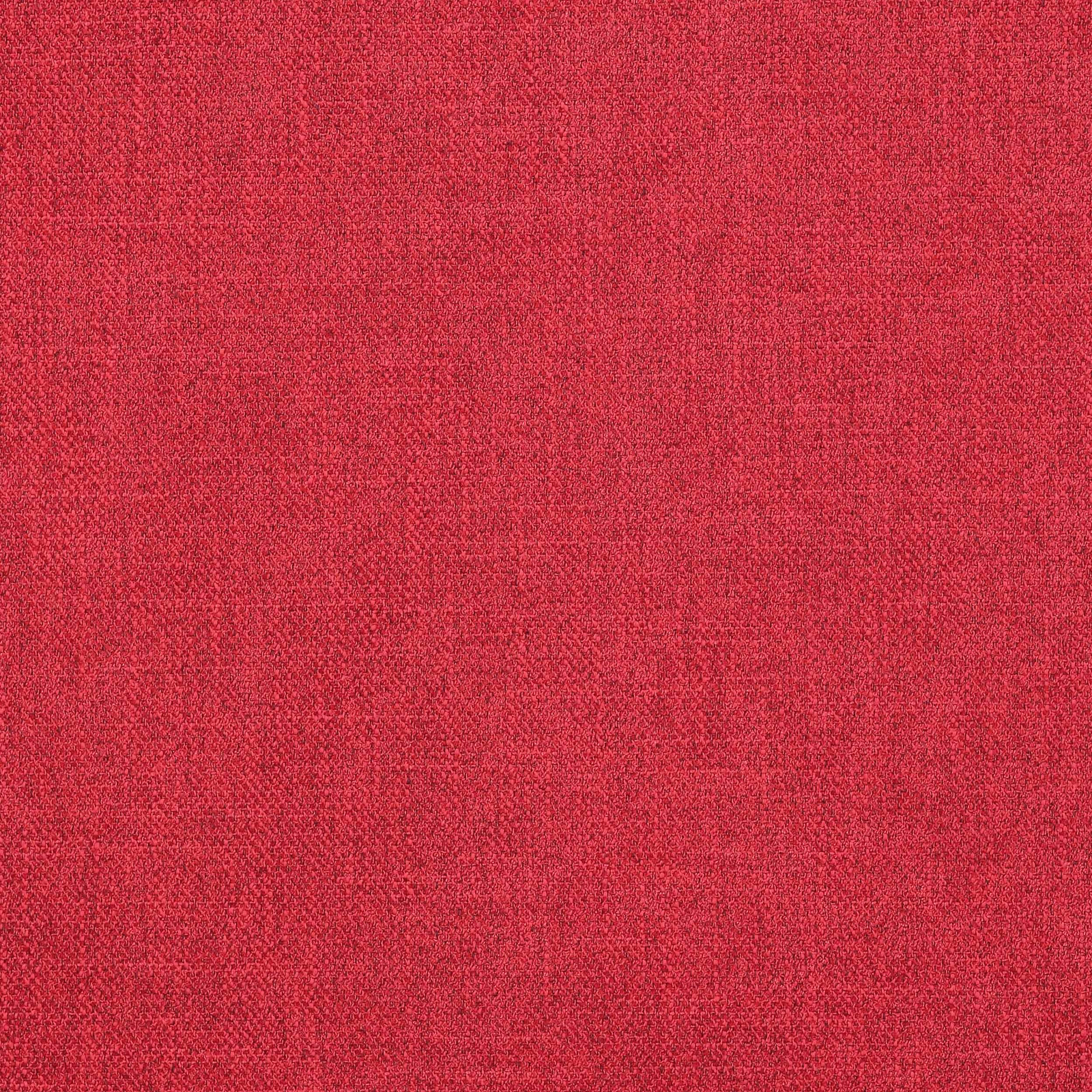 Close-up of a warm raspberry red plain woven fabric with subtle mottled texture