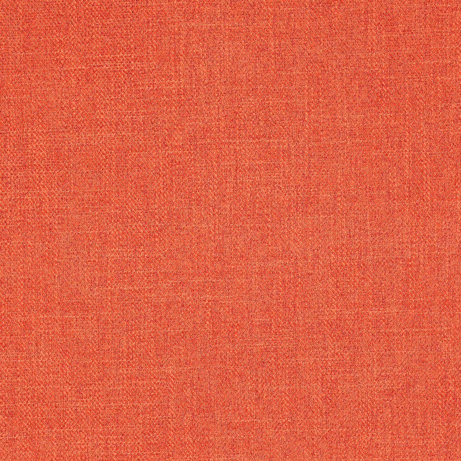 Close-up of tomato coral textured plain fabric with subtle mottled weave