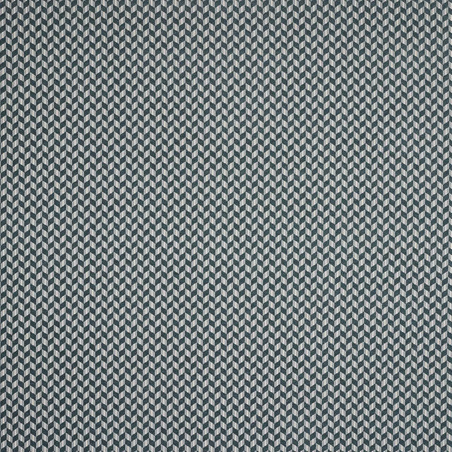 Close-up of a small geometric woven fabric in deep teal and pale grey