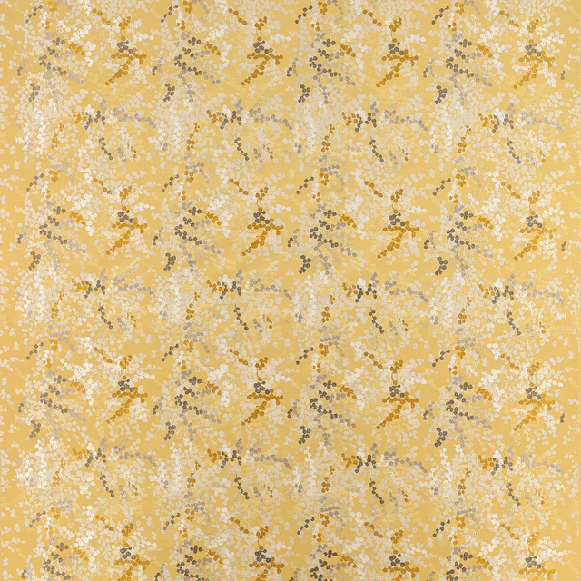 Golden yellow fabric with a fine dotted abstract pattern in cream and brown