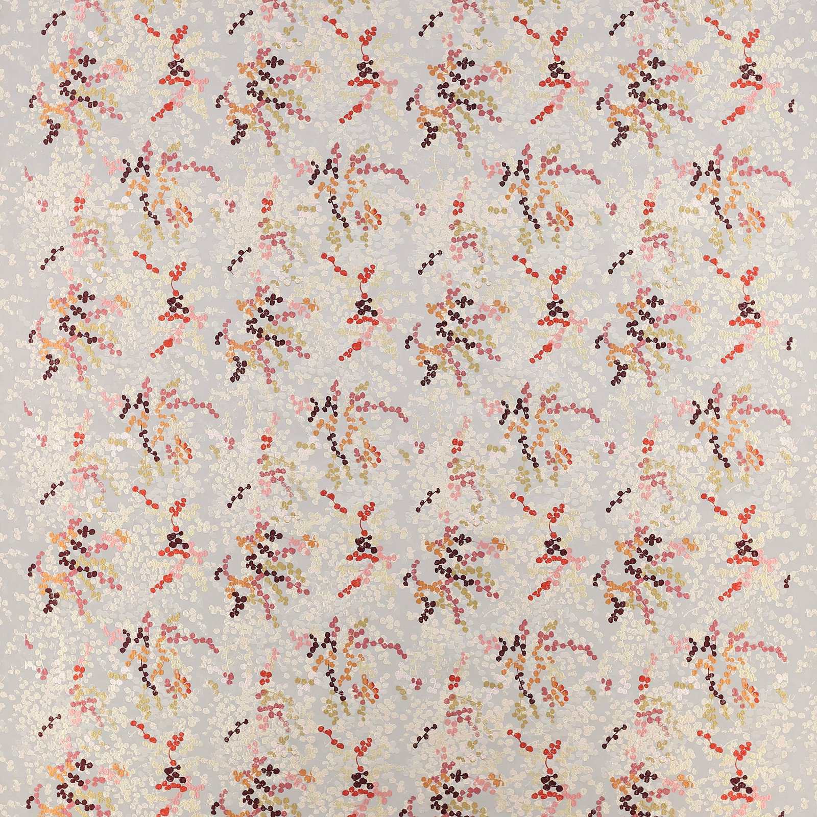 Pale ground fabric with small scattered red, ochre and plum botanical sprays