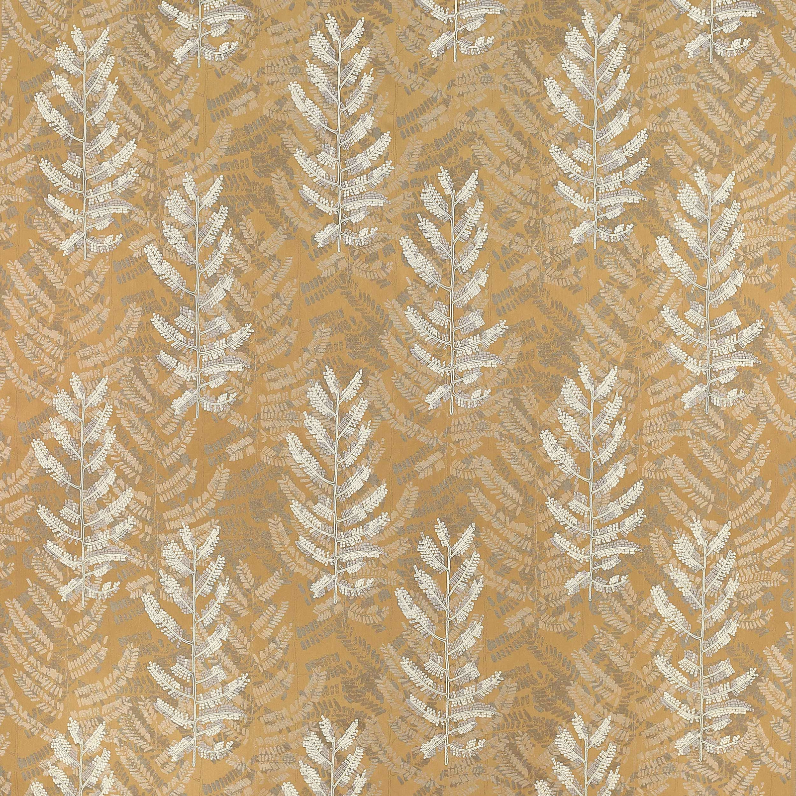 Warm umber jacquard with pale leaf motif on an ochre ground