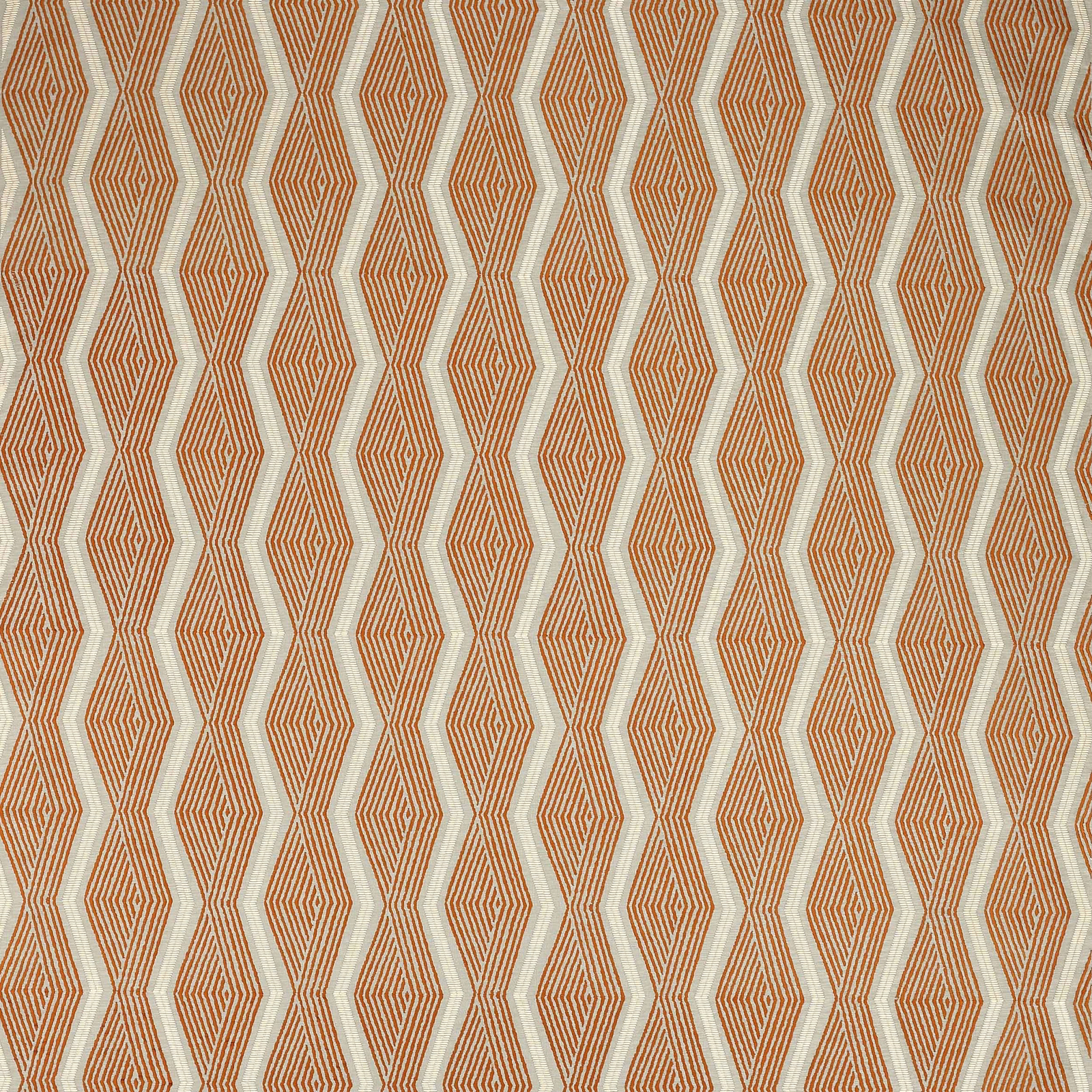 Copper-orange geometric fabric with narrow diamond stripes and cream zigzag channels