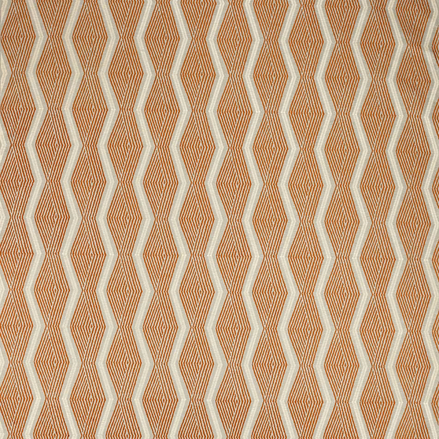 Copper-orange geometric fabric with narrow diamond stripes and cream zigzag channels