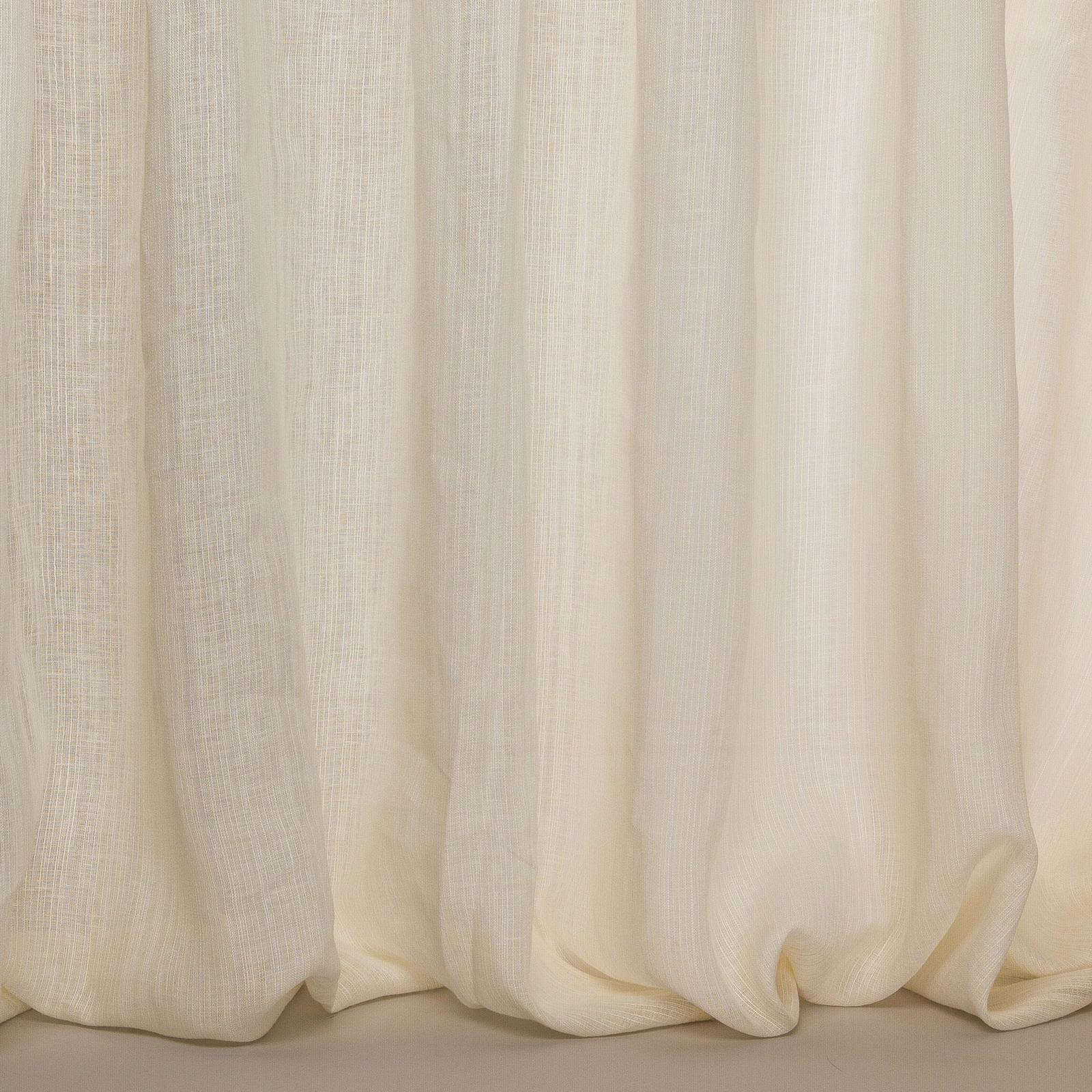 Soft ivory linen-blend fabric with gentle vertical slub and flowing folds