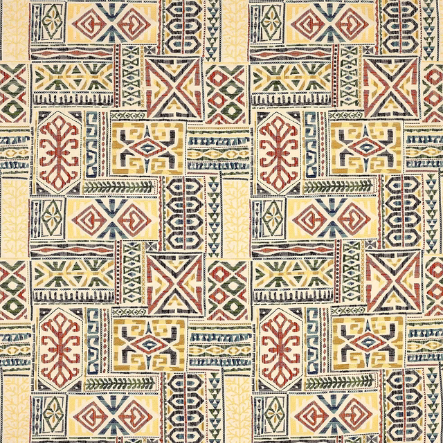 Cream multicolour geometric fabric swatch with red, yellow, blue and green motifs