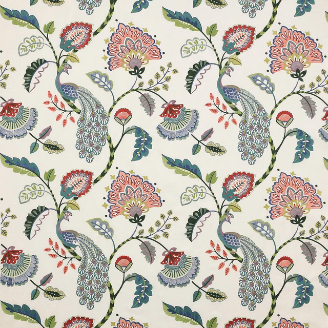 Ivory fabric swatch with peacock birds and floral vines in teal, pink and green
