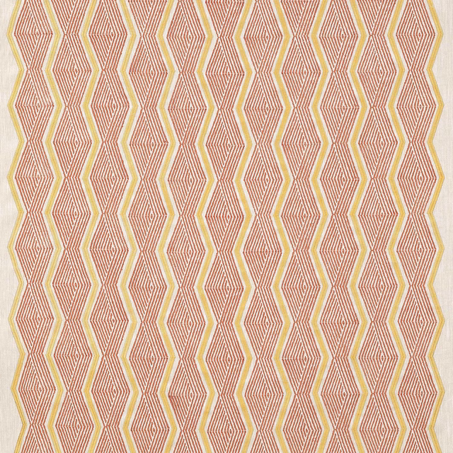 Coral and gold geometric diamond fabric on a pale ground, repeated vertically