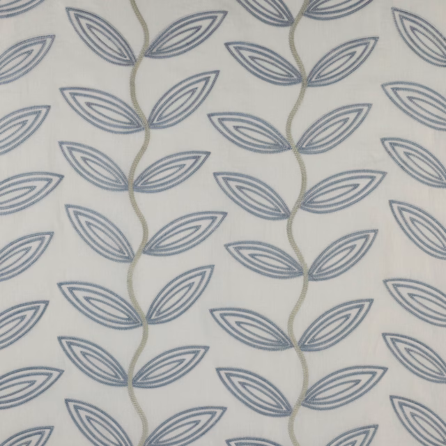 Ivory fabric swatch with blue-grey leaf motif and pale olive trailing stems