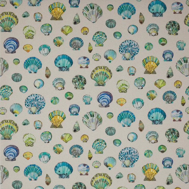 Small shell motifs in aqua, teal and yellow on a warm ivory ground