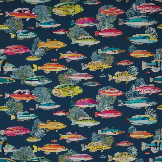 Navy fabric swatch printed with colourful tropical fish and pale coral motifs