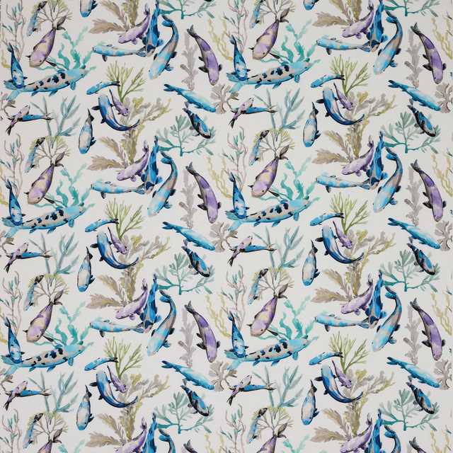 Printed fabric swatch with turquoise and lilac fish over pale coral branches