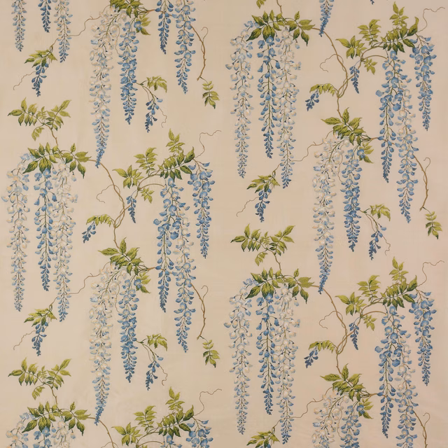 Blue and green wisteria trail on an ivory silk-blend fabric swatch