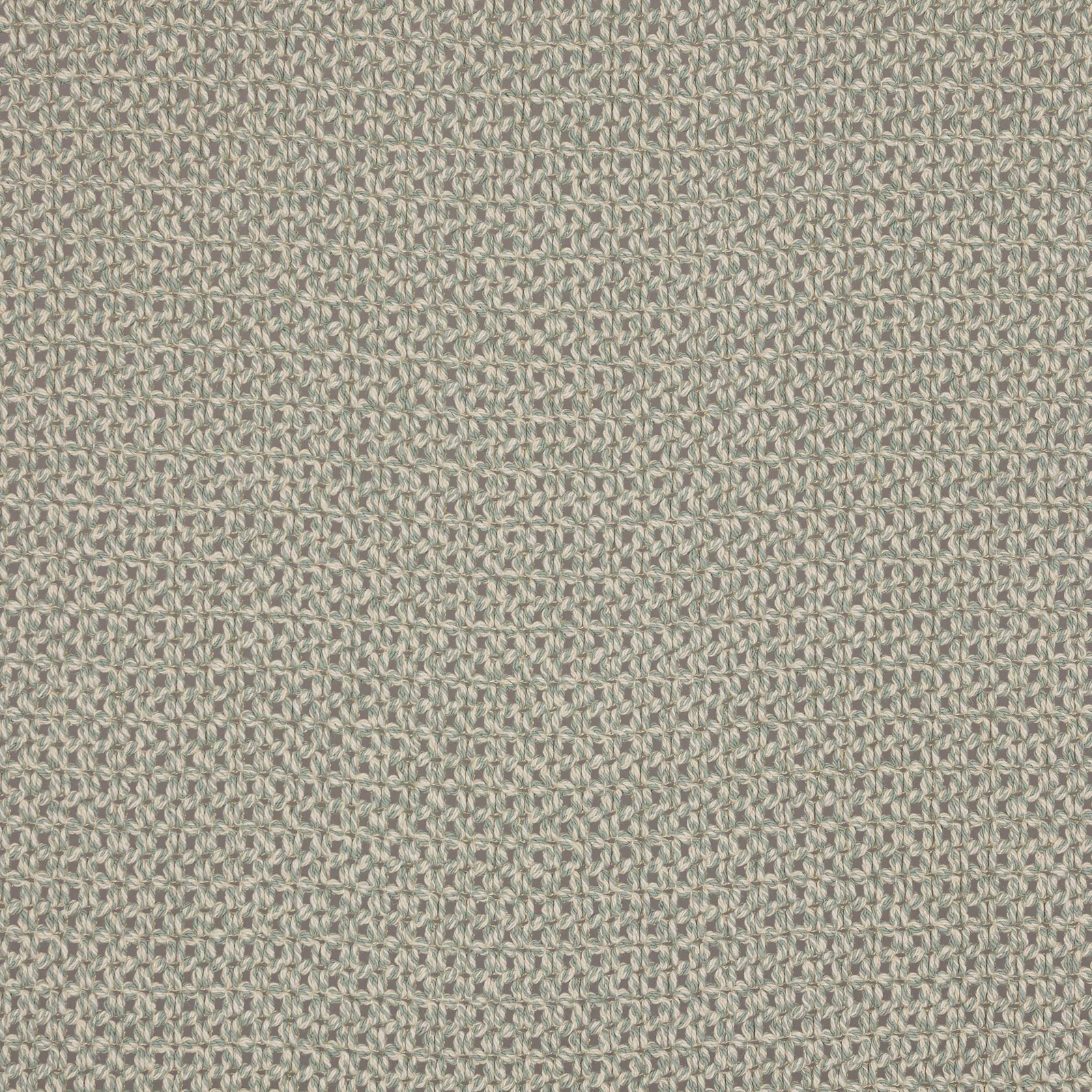 Close-up of pale sage-green woven fabric with a fine looped texture