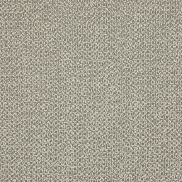 Close-up of pale sage-green woven fabric with a fine looped texture